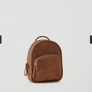 Roots leather mini backpack made in Canada